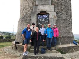 Rotary Club members Ian Cochrane and Jan Jackson at the top of Hartshead Pike with local resident Dave Ryan, Karen Rees-Unwin from The Big Local and Councillor Adrian Pearce and his partner Christine Beardman.